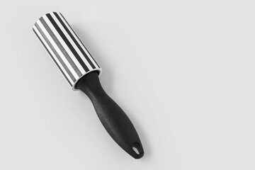 New lint roller on light background