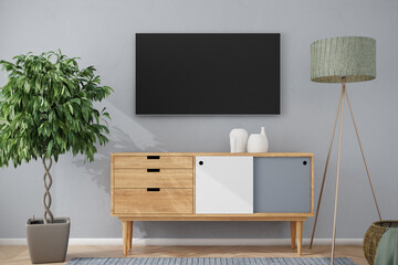 A flatscreen TV mockup on a gray structured wall with sideboard, porcelain vases, fig tree and a...