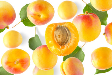 Accidentally falling apricots. In the center is a half apricot with a stone 