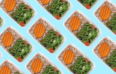 Set of plastic food containers with prepared meals on turquoise background, flat lay