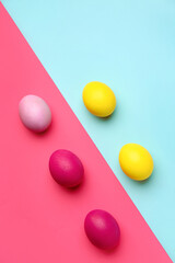 Painted eggs for Easter celebration on color background