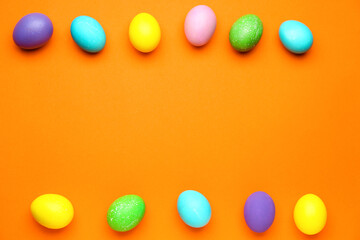 Painted eggs for Easter celebration on color background