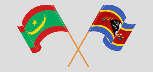 Crossed and waving flags of Mauritania and Eswatini