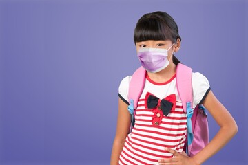 Little girl wearing a face mask to go outside during the pandemic