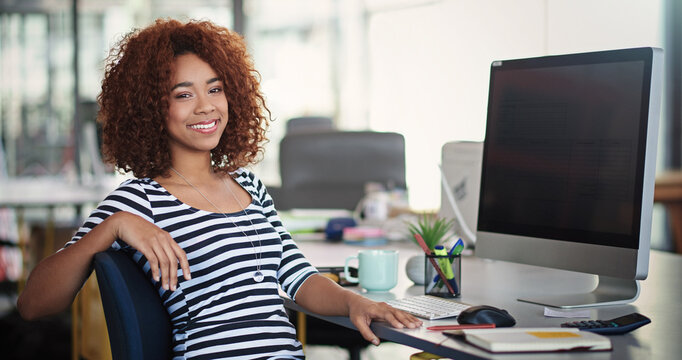 My Career Is Just Getting Started. Portrait Of A Designer Sitting At Her Desk In An Office.