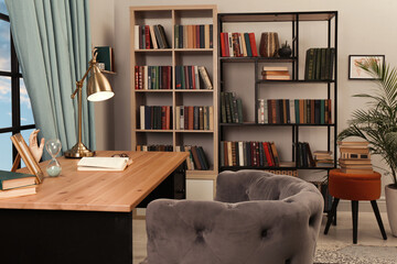 Cozy home library interior with collection of different books on shelves