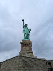 Fototapeta na wymiar statue of liberty and cloudy day