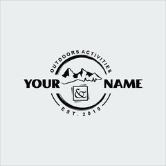 black outdoor logo badge with mountain