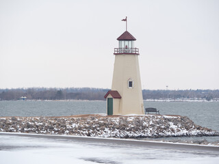 Overcast view of the snowy Lake Hefner lighthouse