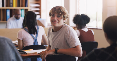 Life is one big lesson. Portrait of a teenage boy in a classroom at high school.