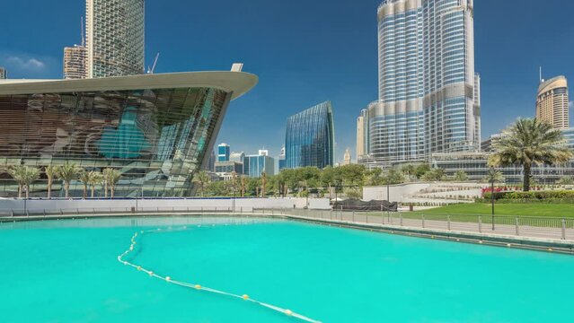 Burj park with fountain pool timelapse hyperlapse.