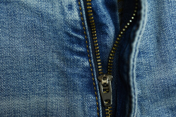 metallic zip on blue jeans