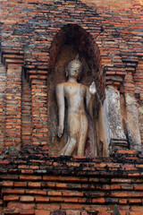 Ancient antiquity architecture and antique ruins building for thai people travelers travel visit respect praying at Si Satchanalai Historical Park and Unesco World Heritage Site in Sukhothai, Thailand