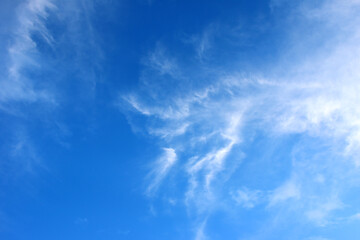 Blue sky background and white clouds soft focus