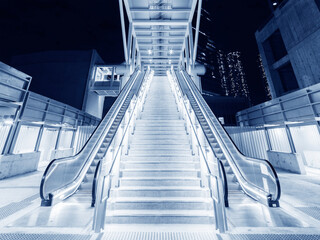 Night scenery of modern escalator in downtown district of Hong Kong city