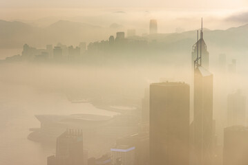 Skyscraper in downtown of Hong Kong city in fog