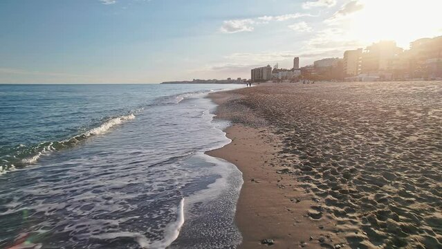 Moving forward at the beach coastline of Benalmadena, south of Spain