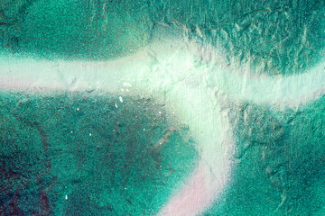 colorful wallpaper texture of spray graffiti background, wonderful aerosol drawing close up, urban art backdrop on wall, rough bright surface