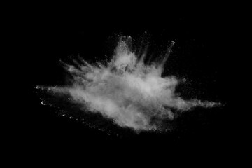 White powder explosion on black background. Colored cloud. Colorful dust explode. Paint Holi.