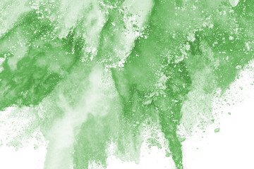 abstract powder splatted background,Freeze motion of green powder exploding,throwing orange dust on...