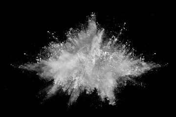 Obraz premium White powder explosion on black background. Colored cloud. Colorful dust explode. Paint Holi.