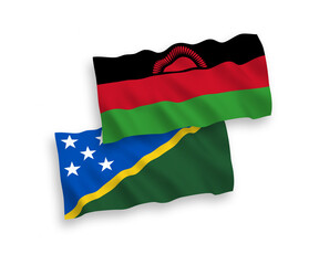 Flags of Solomon Islands and Malawi on a white background