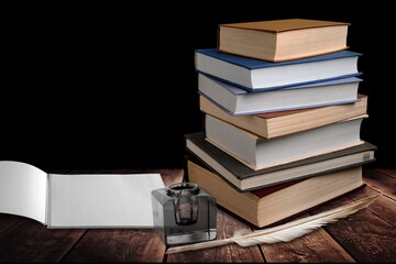 Biblical commandment, quill and stack of shabby old jewish books. Jewish prayer Shema Yisrael in hebrew to fulfill