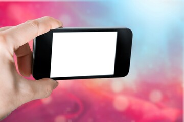 Hand holds phone Sample social media app interface on mobile phone showing shared video content