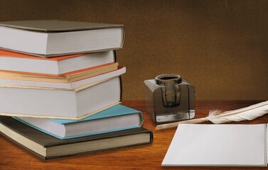 Biblical commandment, quill and stack of shabby old jewish books. Jewish prayer Shema Yisrael in hebrew to fulfill