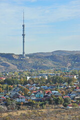 Fototapeta premium Almaty, Kazakhstan - 10.19.2012 : Residential buildings and commercial buildings located in the city center at the foot of the mountains.