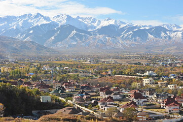 Almaty, Kazakhstan - 10.19.2012 : Residential buildings and commercial buildings located in the city center at the foot of the mountains.