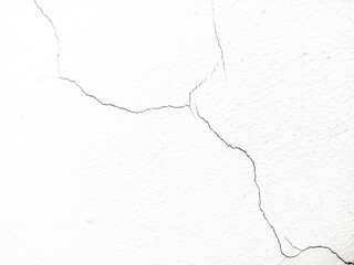 Cracked white wall, concrete wall texture, crack background.