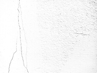 Cracked white wall, concrete wall texture, crack background.