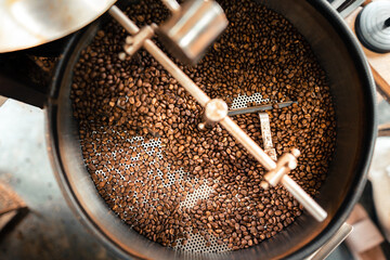 Roasted coffee beans in a cooling machine
