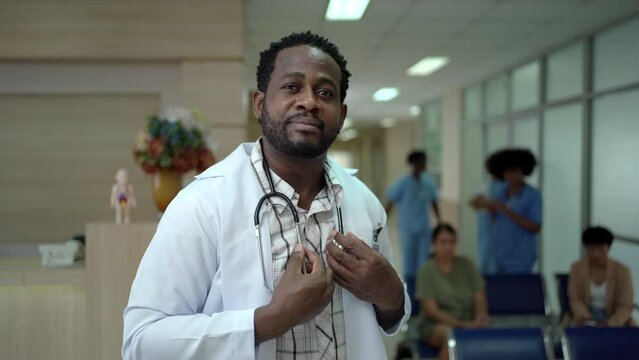 B-roll footage of African doctor looking at the camera.