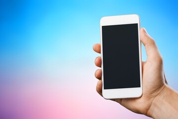 Hand holds phone Sample social media app interface on mobile phone showing shared video content