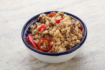 Arabic cous cous with meat and tomato
