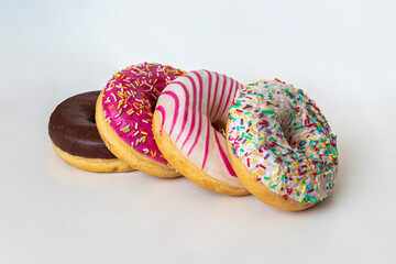 Multicolored donuts with sweet multicolored glaze