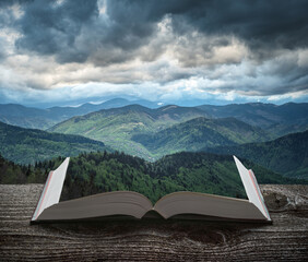Dramatic mountain valley on a book