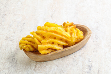 Fried potato slice in the bowl