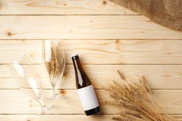 A bottle of beer and grain. Top view. Free space for text.