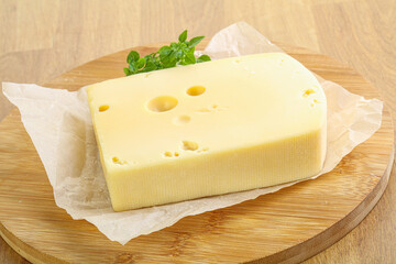 Maasdam cheese over the board