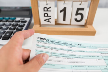 Obraz premium Tax return form 1040 on the table. financial document.