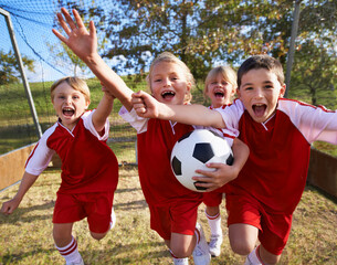 The field holds promise. Shot of a childrens soccer team.