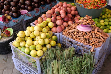 Fresh colourful fruit and vegetables on a stall at the local food market in capital Dili, Timor...