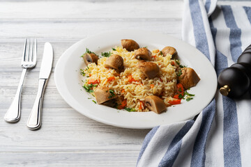 Plate with delicious homemade pilaf with meet