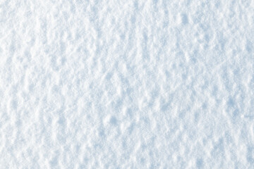 Obraz premium Pure freshly fallen snow. Illuminated by the setting sun. Winter background for design, texture.