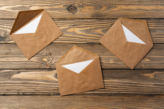 Stack Of Envelopes On Working Desk Top View. Business Mail