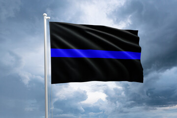 Blue lives matter thin blue line flag on a flagpole. Law enforcement movement flag