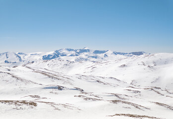 Monte Ocre e Cagno (Campo Felice, Italy) - The suggestive mountain peak in Abruzzo region, Ocre and Cagno summit mount range, during the winter with snow